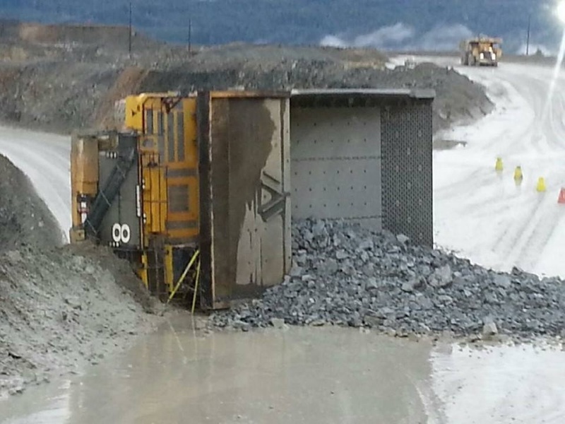 This is a Komatsu 830e flipped on its side. These trucks are about 20 ft tall and 25 ft wide. With a &quot;perfect&quot; load they weigh 830tonnes, the driver who flopped it on its side was fired. (It wasn't me.)